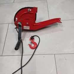 hand-cranked winch designed for use with an RV ladder. 