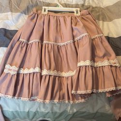 Pink Ruffled Skirt With Ribbons In The Back