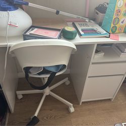 White writing desk with drawers and chair