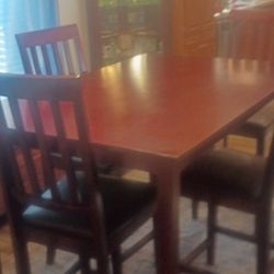 Bar Height Dining Room Table With Four Chairs It Is In Very Good Condition