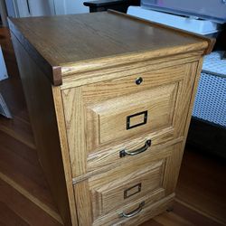 Oak file cabinet w/file holders