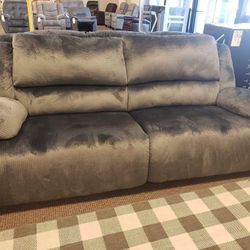 New Ashley Furniture Clonmell Gray Manual Reclining Sofa