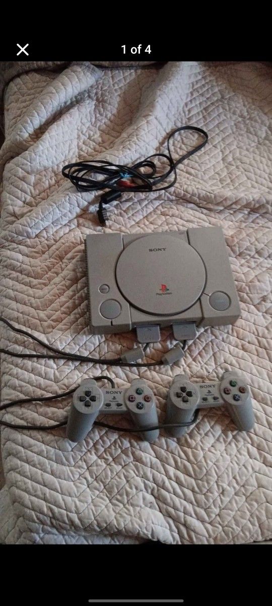 PlayStation 1 With Controller Wires And Console