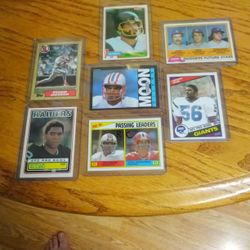 Old Football And Baseball Cards Including Shared 84 Merino Rookie Marcus Allen Rookie Warren Moon Rookie Fernando Velezuela Mike SocRC