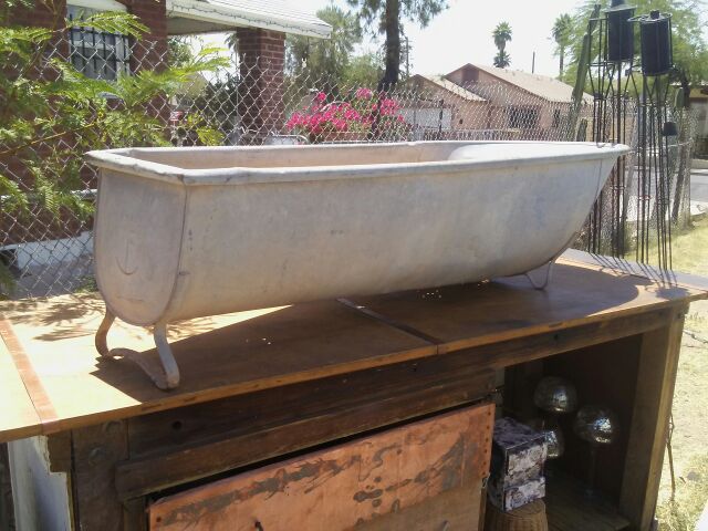 Antique galvanized cowboy bathtub