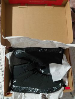 Kids black puma sneakers