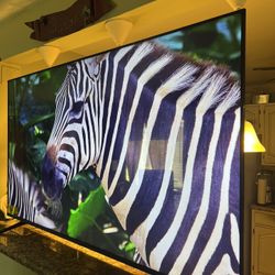 TCL 65 PULGADAS CLASS 6-SERIES 4K UHD DOLBY VISION HDR ROKU SMART TV - 65R615