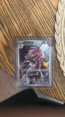 30th Anniversary Pokemon Lycanroc Pokémon Card 133/128 Secret Rare