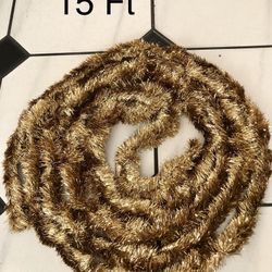 Vintage 15-foot long champagne gold tinsel Christmas garland. 