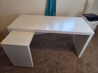White desk with pullout station
