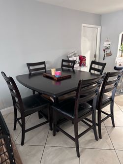 Dining room table with 6 chairs and extension
