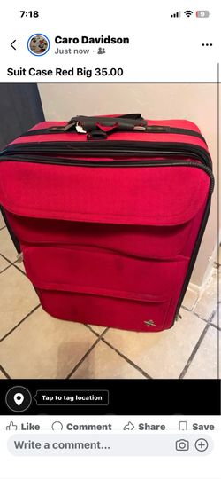 Big red suit case 35.00 and carry on suitcase 25.00