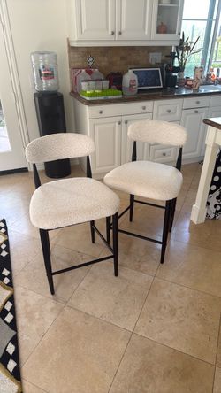 2 boulce Arhaus style counter bar stools