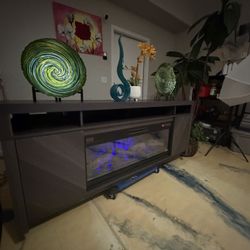 Beautiful Gray fireplace /tv stand in excellent condition 75” inch long