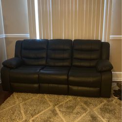 Reclining leather sofa 