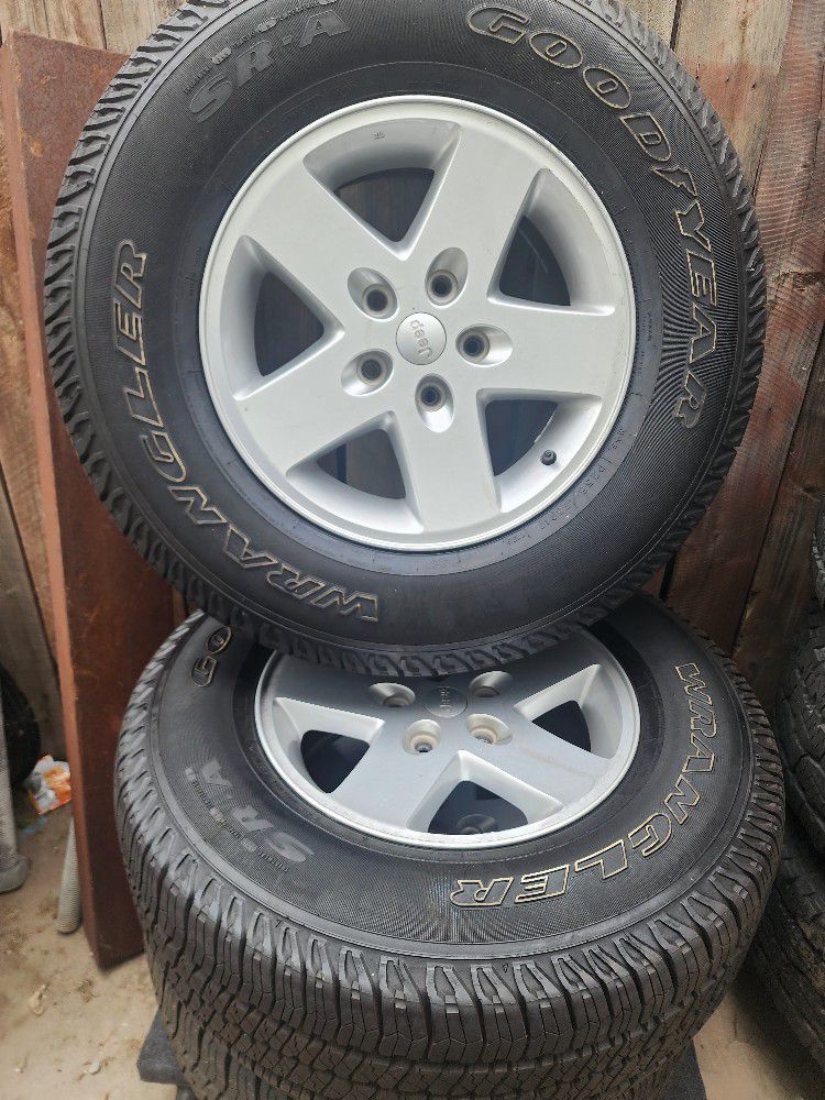 4 Jeep tires and wheels 17"
