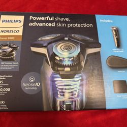 Brand New Philips Norelco Shaver 6900, Smart Shaver with pop up trimmer, travel case, Shaver Cleaning Station plus 2 refills 