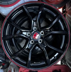 One 20 Inch Rim With Used Tire