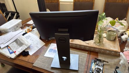 It's black model p2017hc and it can be put on a monitor mount that has four screws