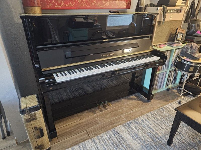 Young Change Upright Piano