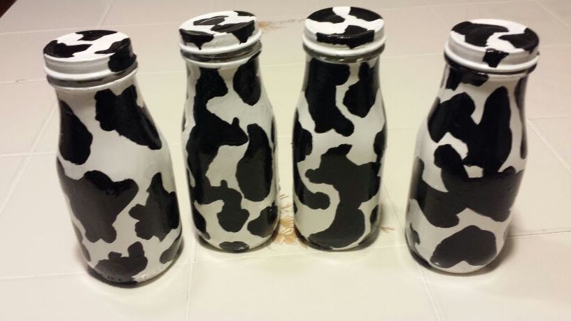 GLASS MILK BOTTLES. COW DESIGN