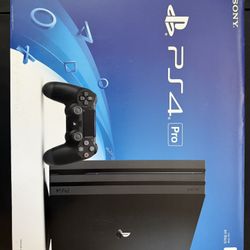 PlayStation 4 Pro - like new, complete in box, w/games (can Deliver)