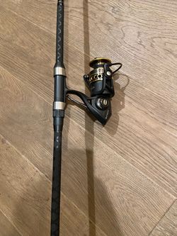 Penn Battle II BTLII5000 paired with Shimano Speed Master SPMS90M2 Power Pro 30-50lb Medium Fast