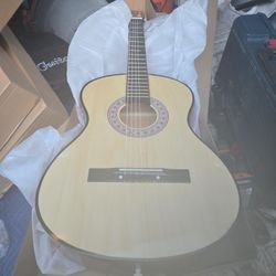 Guitar New Acoustic.
Natural