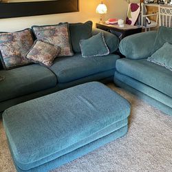 Sofa And Snuggler With Ottoman 