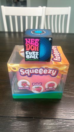 Needoh fuzzball/ peach squeeezy