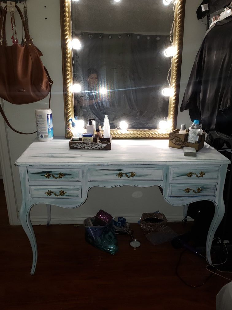 Vanity and mirror with sick on lights