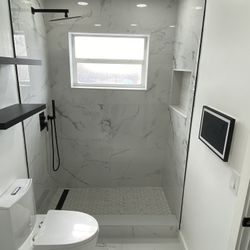 Bathroom Tile With Toilet And Beautiful Vanity 