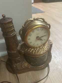 Vintage United clock corp model 290 lighthouse motion clock