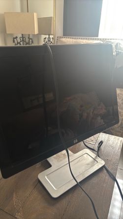 Black and grey hp monitor