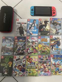 Like New Nintendo Switch With Box And 15+ Games And Carrying Case