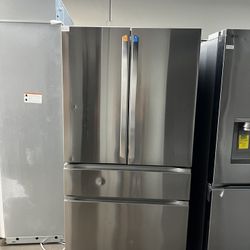 New Open Box Lg Four Door Stainless Steel Refrigerator With Indoor Water/Ice 