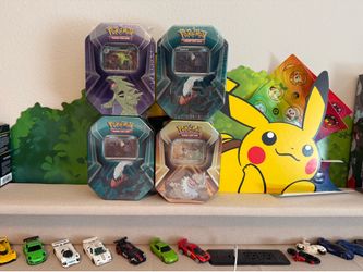 Pokemon TCG tins (4 available)