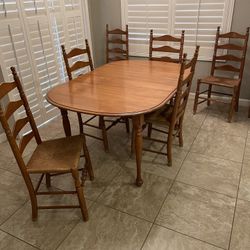 Antique dining table and chairs