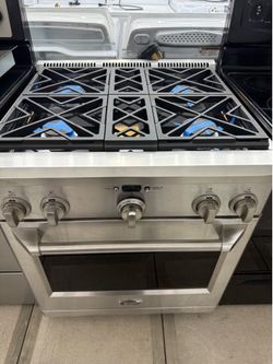Monogram 4 burners gas range and 220 v