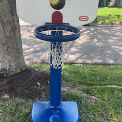 Little tikes adjustable basketball hoop. Has marks from play a net has a rip. Netting is stained/decal is peeling 