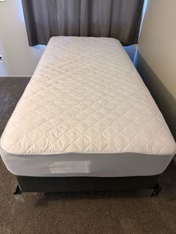 Twin mattress with box spring and frame