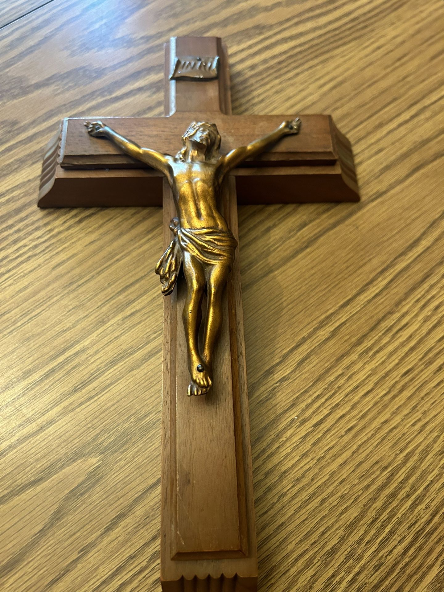 Crucifix with inner compartment and used candles