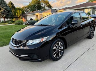 $1,500 – Honda Civic EX • 98K Miles & Clean