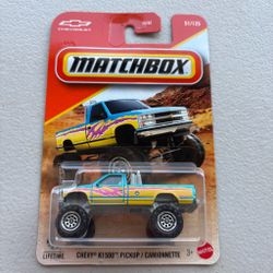 Matchbox Chevy K1500 Pickup with yellow and blue body with pink flame decals #matchbox #pickup