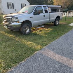 2004 F250 Ford Full-size Long bed  ,59000 Miles,4 Wheel Drive, Aluminum Cap  $19000.