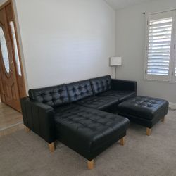 Black L-shaped IKEA Couch With Matching Ottoman