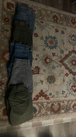 Bundle of jeans size 0 and 4 one is a size small