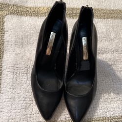 Woman’s Black BCBG Generation Leather Stilettos 