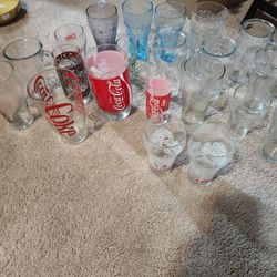 Various vintage Coca Cola Glasses