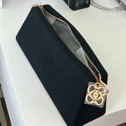      Très Gelée black/red silicone clutch bag.  